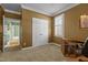 A bedroom featuring a closet, neutral carpet, base molding, and picture-frame-molding at 319 Fox Hollow Dr, Clayton, NC 27527