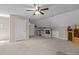Spacious carpeted bonus room with sloped ceilings and several storage spaces at 319 Fox Hollow Dr, Clayton, NC 27527