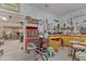 Organized garage space featuring a workbench and tool storage for hobbies and home projects at 319 Fox Hollow Dr, Clayton, NC 27527