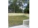 Large backyard is enclosed with a light wooden fence at 3302.5 Hall Pl, Raleigh, NC 27607