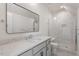 Bathroom featuring modern vanity with white countertop and glass shower at 3302.5 Hall Pl, Raleigh, NC 27607