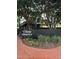 Charming Village District entrance with vibrant landscaping and inviting signage, a local favorite at 3302.5 Hall Pl, Raleigh, NC 27607