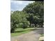 Scenic walking path winding through lush greenery and mature trees, promoting an active lifestyle at 3302.5 Hall Pl, Raleigh, NC 27607