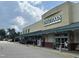 Facade view of a Whole Foods Market with storefront parking and exterior seating at 3302.5 Hall Pl, Raleigh, NC 27607