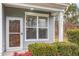 Home exterior featuring a front door, large window, front porch, and house number at 3417 Cardinal Lake Dr, Durham, NC 27704