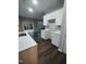 Modern kitchen with white cabinets and quartz countertops at 788 Roberts Rd, Sanford, NC 27332