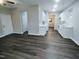 Bright living room with laminate flooring and an open floor plan at 788 Roberts Rd, Sanford, NC 27332