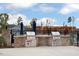 Community grilling area with stainless steel grills, brick countertops, and convenient access at 800 Heathered Farm Way, Apex, NC 27523