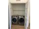 Convenient laundry closet with modern washer and dryer, plus shelf for storage at 120 Mosaic Blvd # 307, Pittsboro, NC 27312
