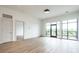 Bright and airy living room with large windows and a sleek modern design at 120 Mosaic Blvd # 307, Pittsboro, NC 27312