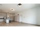 Open living space with modern kitchen, lighting, and wood style flooring at 120 Mosaic Blvd # 307, Pittsboro, NC 27312