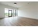Spacious living room featuring large windows offering great natural light at 120 Mosaic Blvd # 307, Pittsboro, NC 27312