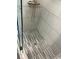 Modern shower design with glass doors, a rain showerhead, and stylish tile, offers a luxurious and relaxing experience at 120 Mosaic Blvd # 307, Pittsboro, NC 27312