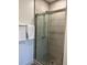 Sleek shower stall features contemporary design with glass doors and modern fixtures, creating a luxurious showering experience at 120 Mosaic Blvd # 307, Pittsboro, NC 27312