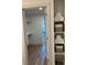 Bright walk-in closet offering ample storage, paired with convenient shelving, enhancing the home's organization and appeal at 120 Mosaic Blvd # 307, Pittsboro, NC 27312