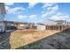 Large backyard features a deck, play set, and storage shed, enclosed by a wooden fence at 2062 Alderman Way, Creedmoor, NC 27522