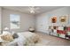 Bright bedroom with a ceiling fan, closet, and an assortment of books on a custom shelf at 2062 Alderman Way, Creedmoor, NC 27522