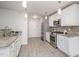 This modern kitchen features stainless steel appliances and granite countertops at 2062 Alderman Way, Creedmoor, NC 27522