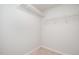 Walk-in closet with carpet and overhead storage, ready for customizable organization at 2062 Alderman Way, Creedmoor, NC 27522