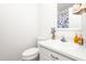 Bright bathroom featuring white fixtures, a decorative shower curtain, and a modern vanity at 2169 Northcrest Dr, Elon, NC 27244
