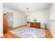 Bright dining room featuring hardwood floors and a stylish light fixture at 2169 Northcrest Dr, Elon, NC 27244