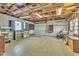 Unfinished basement space with concrete walls and floors, offering potential for customization at 229 Davis Mill Rd, Selma, NC 27576