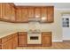 A classic kitchen space featuring ample cabinetry and a functional layout for cooking and storage at 229 Davis Mill Rd, Selma, NC 27576