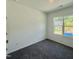 Comfortable bedroom with carpet and a window at 350 Tormore, Homesite 126, Sanford, NC 27330