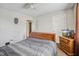 Cozy bedroom with wood furniture and a TV at 512 Drexel Rd, Rocky Mount, NC 27803