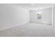 Bedroom with neutral carpet and window at 150 Whimbrel Ct, Lillington, NC 27546