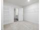 Bedroom closet with carpet floors and wire shelving at 150 Whimbrel Ct, Lillington, NC 27546