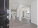 Open foyer featuring hardwood floors, coffered ceilings and a view into the living areas at 150 Whimbrel Ct, Lillington, NC 27546