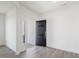 Bright foyer featuring a dark door and neutral walls and floors at 150 Whimbrel Ct, Lillington, NC 27546