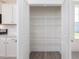 Walk-in pantry with wire shelving for organized storage, conveniently located near the kitchen at 150 Whimbrel Ct, Lillington, NC 27546