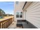 A cozy, furnished wooden deck provides an inviting outdoor retreat with views at 254 Dungannon, Clayton, NC 27520