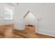 Charming pet nook featuring a cute entryway for a small dog or cat with hardwood floors at 254 Dungannon, Clayton, NC 27520