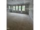 Unfinished bedroom with bright natural light coming in from multiple windows and blank walls at 3302 Hall Pl, Raleigh, NC 27607