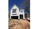 New construction home featuring a two-story frame with large windows at 3302 Hall Pl, Raleigh, NC 27607