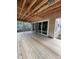 Expansive new deck area with sliding glass doors that seamlessly connects indoor and outdoor living spaces at 3302 Hall Pl, Raleigh, NC 27607