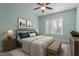 Stylishly furnished bedroom with a neutral color palette, soft lighting, and tasteful decor creates a relaxing atmosphere at 4324 Brighton Ridge Dr, Apex, NC 27539