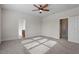Spacious bedroom with neutral walls, carpet, and natural light offers a blank canvas for personalized decor at 4324 Brighton Ridge Dr, Apex, NC 27539