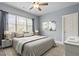 Stylishly furnished bedroom with a neutral color palette, soft lighting, and tasteful decor creates a relaxing atmosphere at 4324 Brighton Ridge Dr, Apex, NC 27539