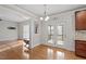 Bright dining area with hardwood floors that opens to a deck, perfect for indoor-outdoor living at 4324 Brighton Ridge Dr, Apex, NC 27539