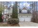 Inviting home with two-car garage, manicured lawn, covered porch, and American flag at 4324 Brighton Ridge Dr, Apex, NC 27539