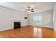 Spacious living room features a cozy fireplace, hardwood flooring, and ample natural light at 4324 Brighton Ridge Dr, Apex, NC 27539