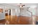 Bright, open-concept living room with hardwood floors and easy access to the kitchen at 4324 Brighton Ridge Dr, Apex, NC 27539