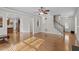 Sun-drenched living room featuring hardwood floors and an open layout at 4324 Brighton Ridge Dr, Apex, NC 27539