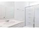 Bathroom featuring a shower and a sink with a quartz countertop at 59 Davinhall Dr, Fuquay Varina, NC 27526