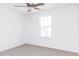 Bright bedroom with a ceiling fan and a window that provides natural light at 59 Davinhall Dr, Fuquay Varina, NC 27526