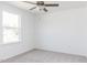Bright bedroom with a ceiling fan and a window that provides natural light at 59 Davinhall Dr, Fuquay Varina, NC 27526